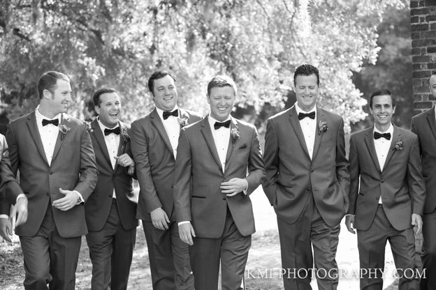 groom and groomsmen gathered for wedding in Wilmington NC