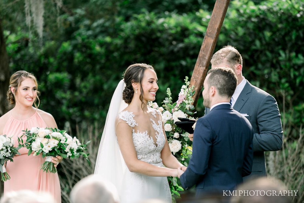 vow exchange under the oak at Wrightsville Manor 