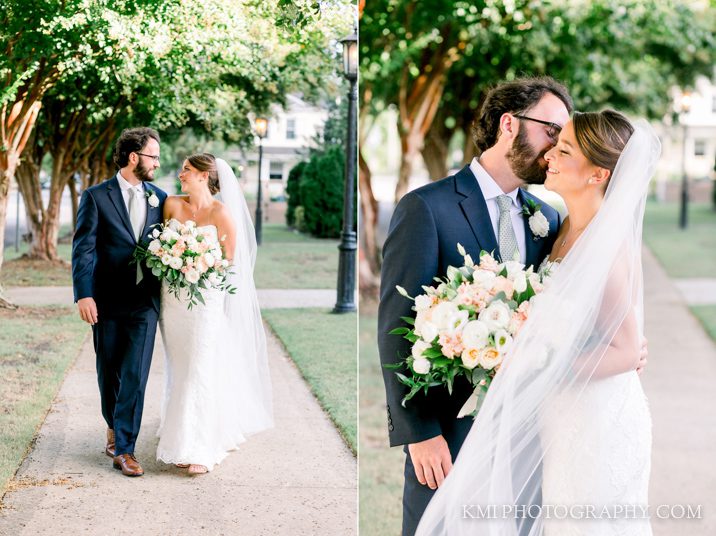 a couple poses in front of their wilmington wedding venue