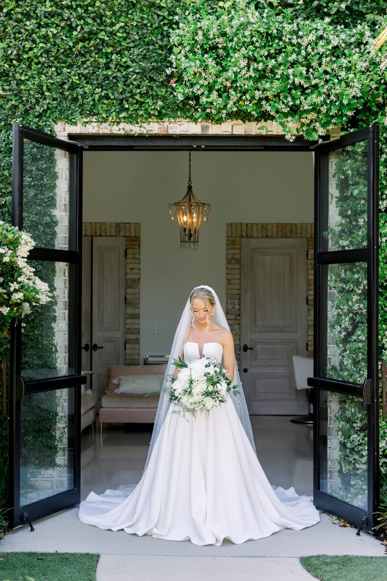 a bride getting ready at Wrightsville Manor for her Wilmington wedding