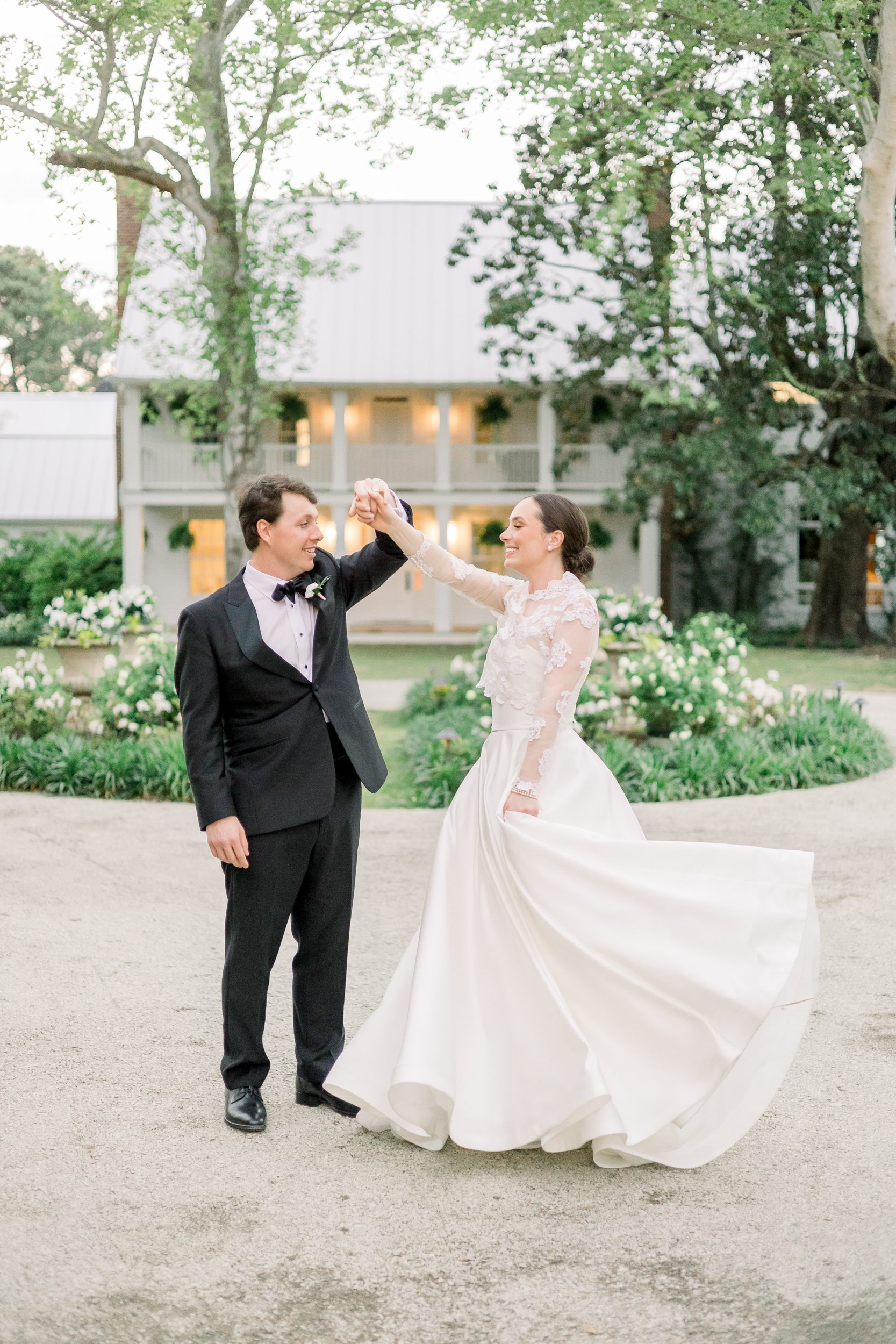 Bride and groom portraits in front of the manor at Sycamore Bend Estate Wilmington NC