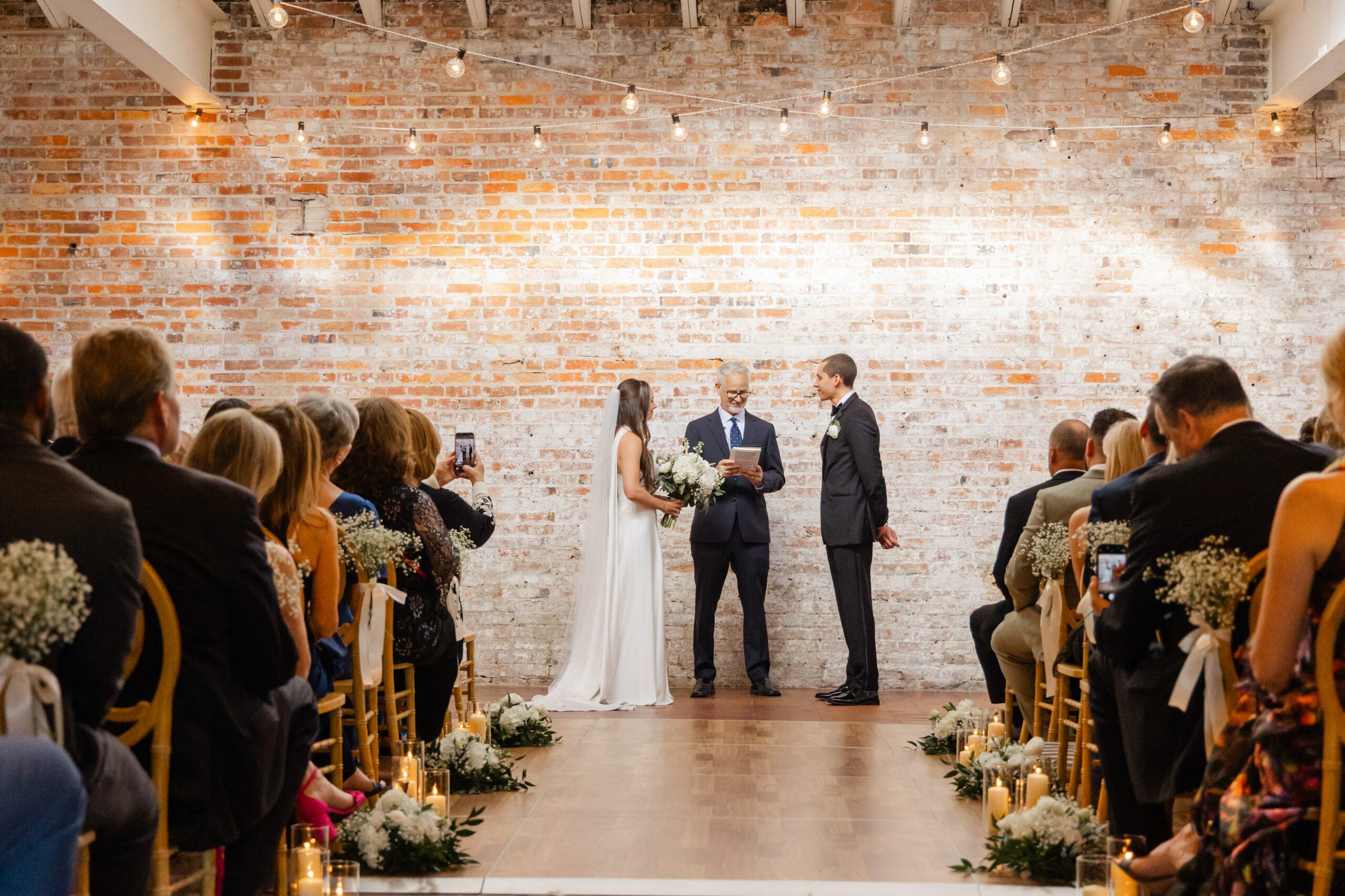 Wedding ceremony at Bakery 105, photographed by Bakery 105 wedding photographers.