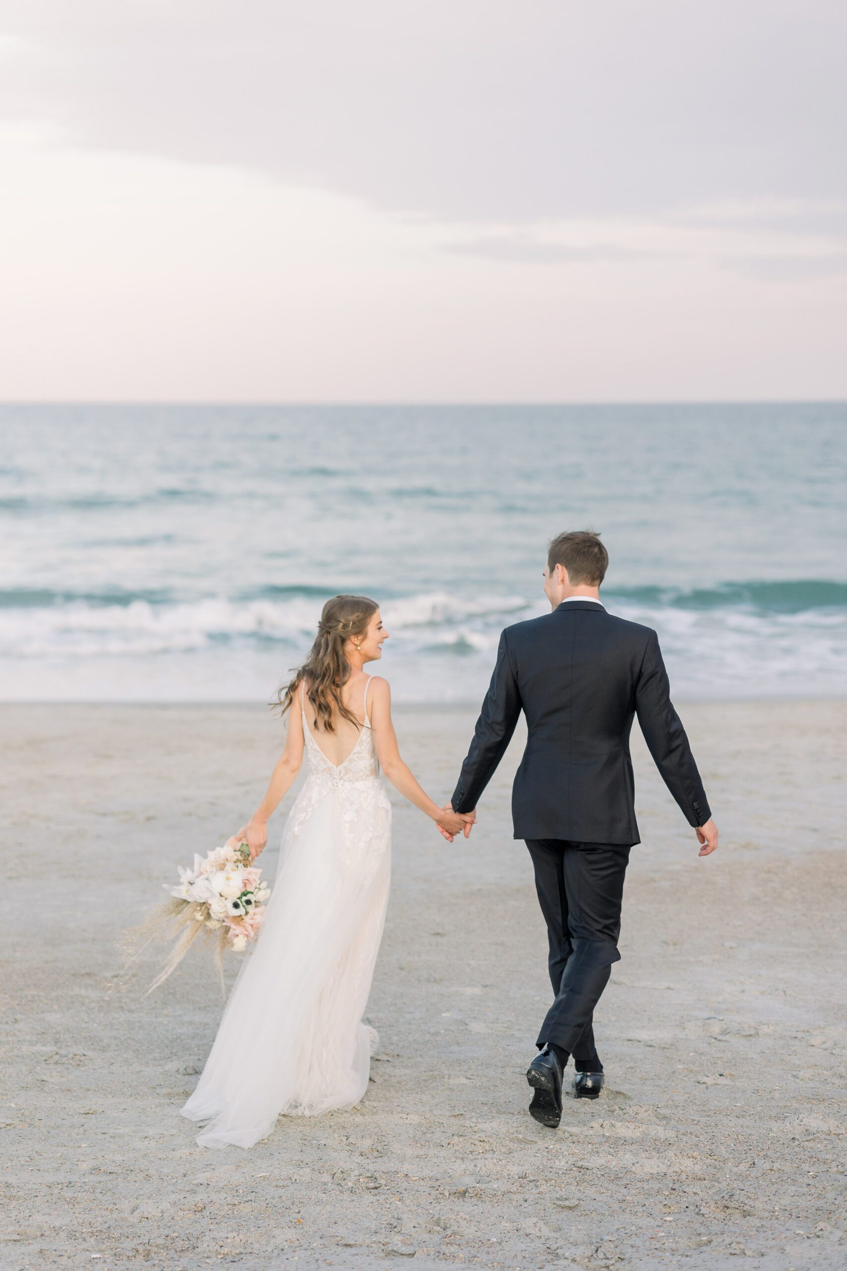 Wrightsville Beach wedding photographer capturing coastal wedding portraits
