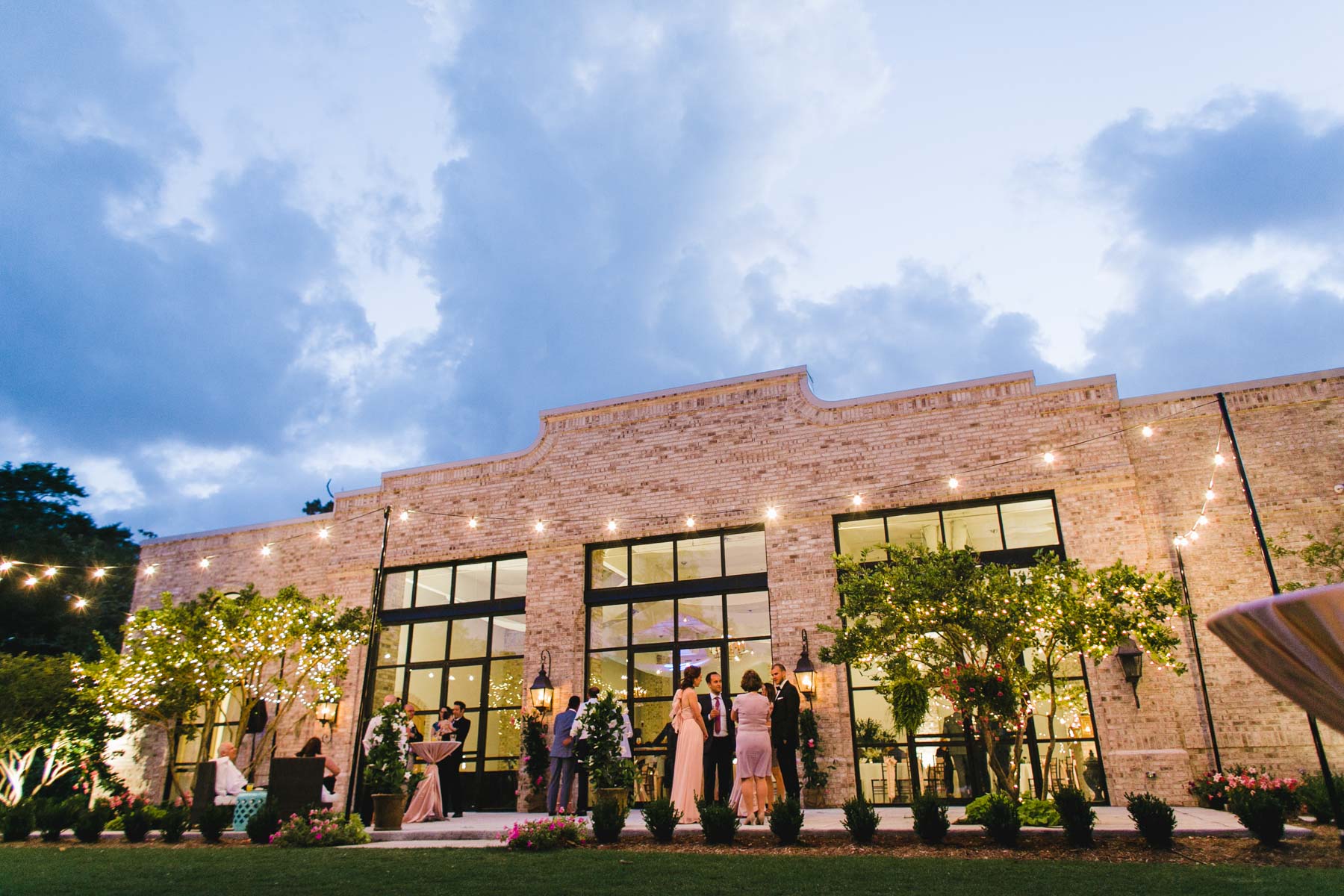 Wrightsville Manor, and beautiful Wilmington wedding venue, illuminated by string lights