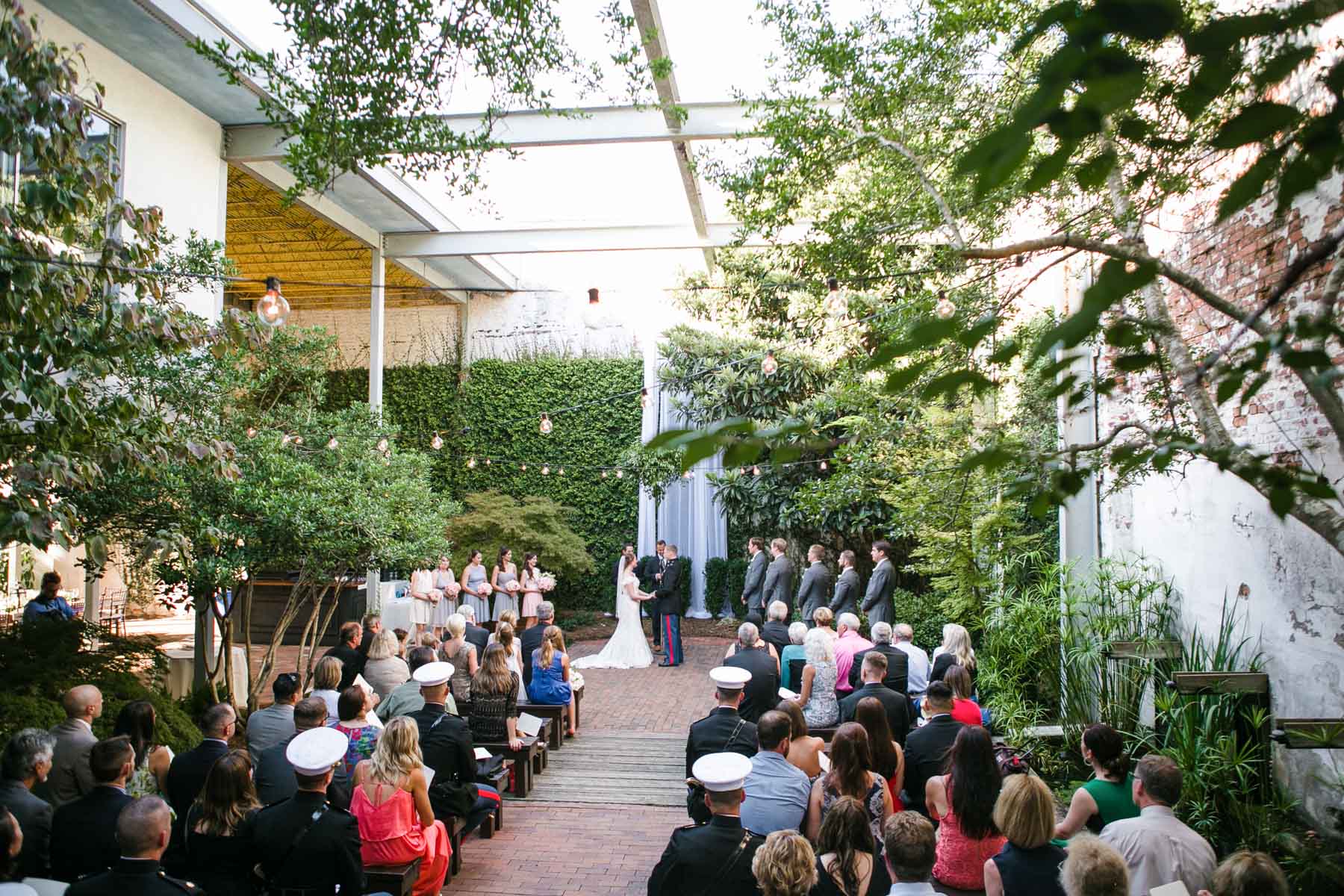 Outdoor wedding ceremony at The Atrium by Ligon Flynn, one of the best Wilmington NC wedding venues downtown