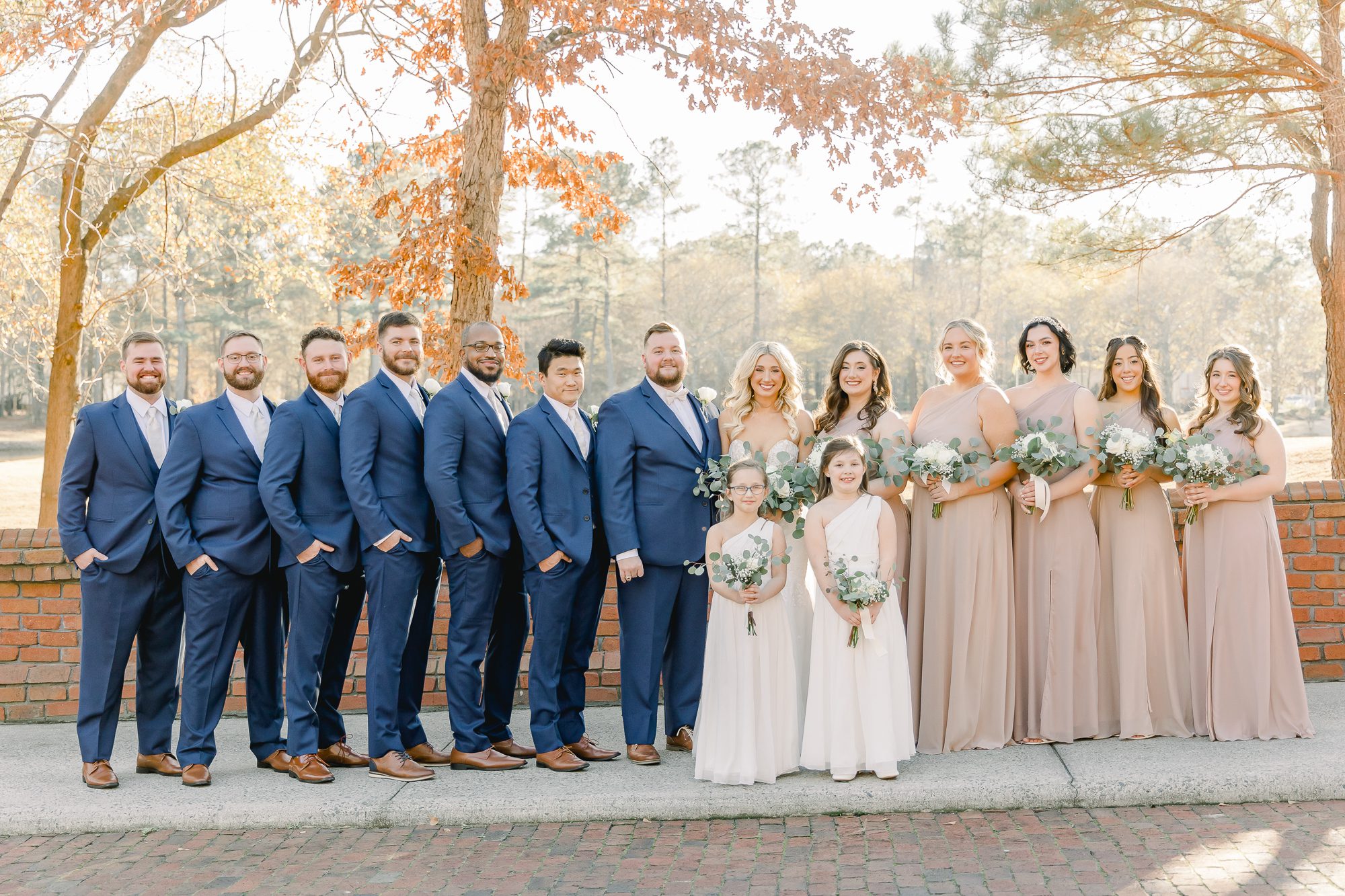 Wedding party portrait on the grounds of River Landing in North Carolina. River Landing wedding photography